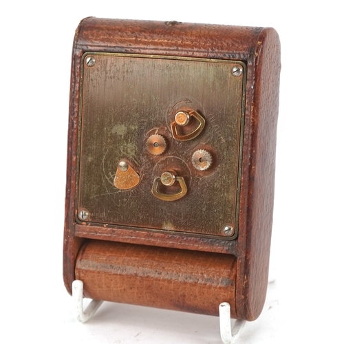 23 - An Art Deco Jaeger LeCoultre folding alarm clock with Arabic numerals, 9cm high.