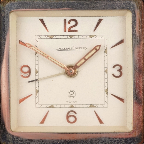 23 - An Art Deco Jaeger LeCoultre folding alarm clock with Arabic numerals, 9cm high.
