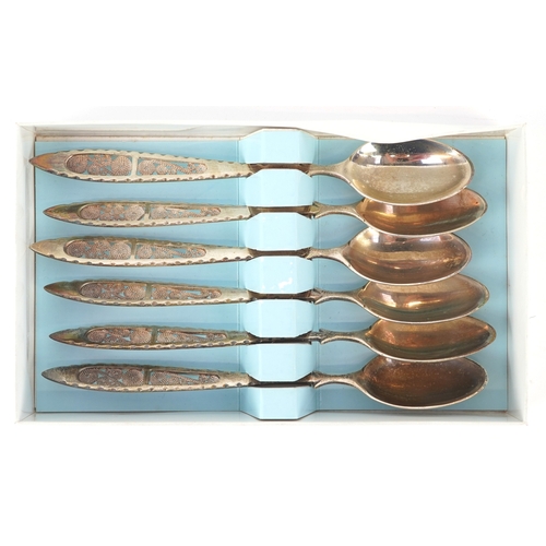 3641 - Antique and later silver comprising two twin handled trophies, a Dutch caddy spoon and set of 830 gr... 