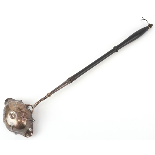 3627 - A George II silver ladle with ebonised handle, indistinct maker's mark, London 1750, 38cm in length,... 