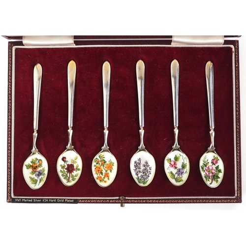 3612 - Cohen & Charles, a set of six silver and guilloche enamel teaspoons hand painted with flowers, house... 