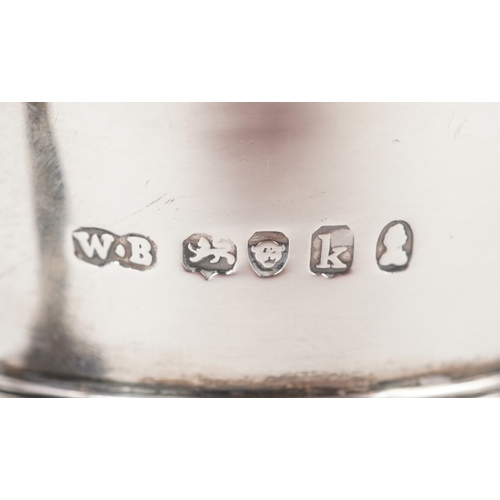 3584 - A George IV silver cream jug having a floral embossed body, entwined serpent handle and a later adde... 