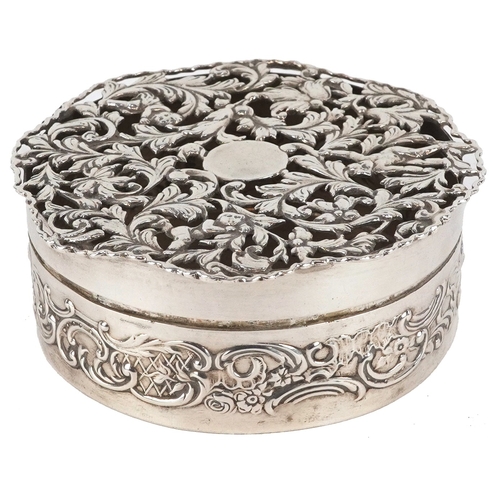 3600 - William Comyns & Sons, an Edwardian circular silver pot pourri box and cover having pierced lid and ... 