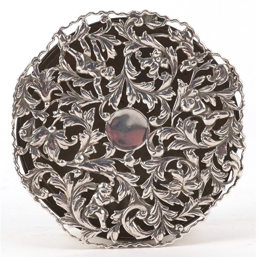 3600 - William Comyns & Sons, an Edwardian circular silver pot pourri box and cover having pierced lid and ... 