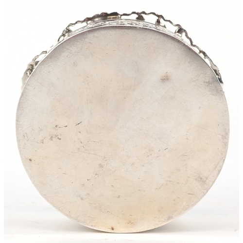 3600 - William Comyns & Sons, an Edwardian circular silver pot pourri box and cover having pierced lid and ... 