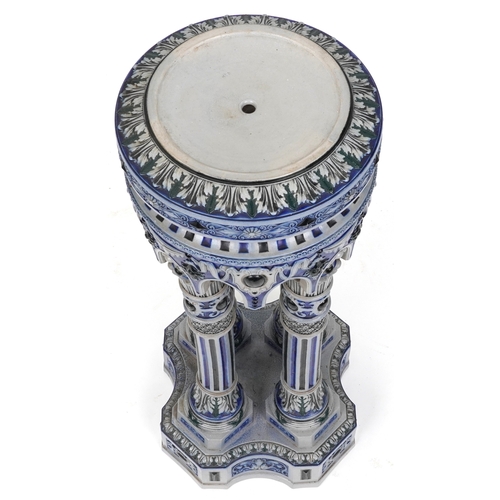 488 - An early 20th century German Westerwald stoneware jardinière stand, the circular top raised on four ... 