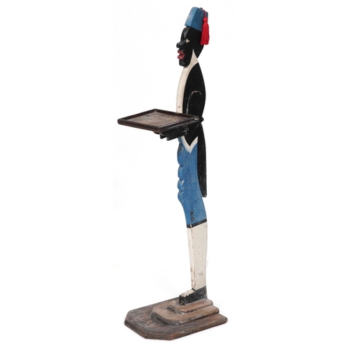 2192 - An early 20th century dumb waiter decorated in black, white and blue, on a stepped plinth base, 94cm... 