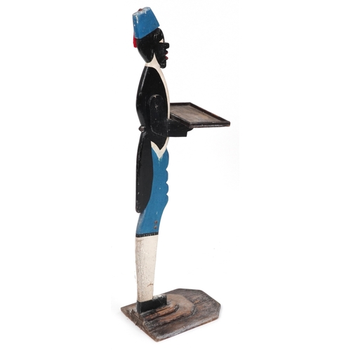 2192 - An early 20th century dumb waiter decorated in black, white and blue, on a stepped plinth base, 94cm... 