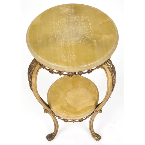 2135 - A late 20th century gilt metal and onyx two tier jardinière stand, 78cm high x 38cm in diameter.