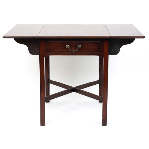 2037 - An late George III mahogany drop flap side table fitted with a drawer, raised on block legs united b... 