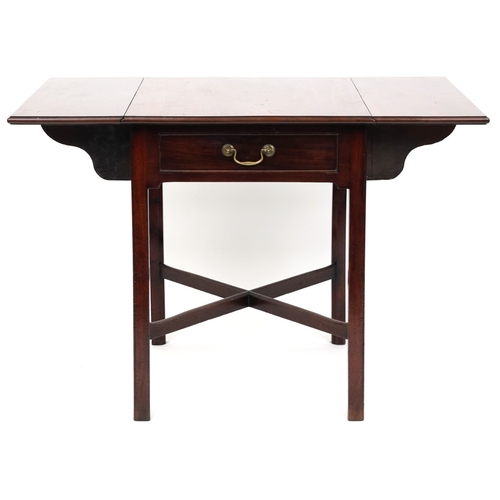 2037 - An late George III mahogany drop flap side table fitted with a drawer, raised on block legs united b... 