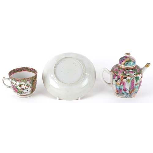 93 - Chinese Canton porcelain comprising a teapot, teacup and saucer, each finely hand painted in the fam... 