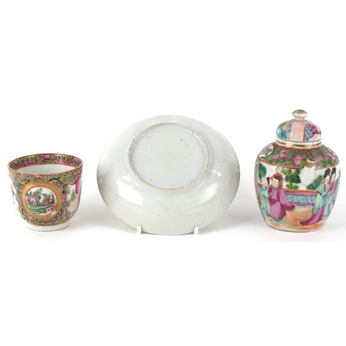 93 - Chinese Canton porcelain comprising a teapot, teacup and saucer, each finely hand painted in the fam... 