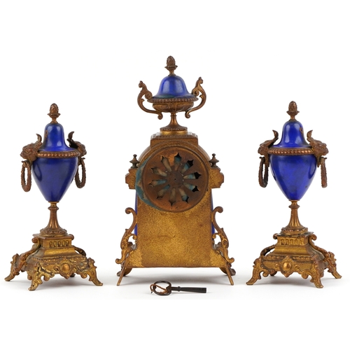 526 - A French 19th century A D Mougin gilt brass and porcelain three piece striking clock garniture hand ... 