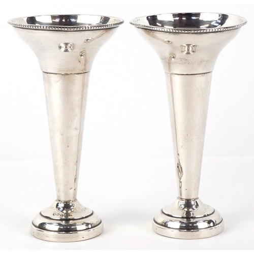 3604 - Alvic Products, a pair of silver tapered candlesticks, Birmingham 1964, 12cm high, total 132.6g.