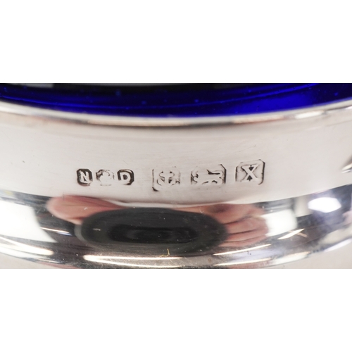 3675 - A Napper & Davenport open salt with blue glass liner and mustard spoon, Birmingham 1922 together wit... 