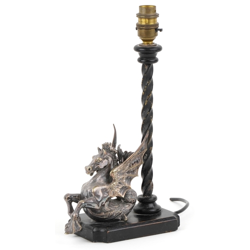 576 - A silver plated study of Pegasus mounted on an ebonised table lamp base, 26cm high.
