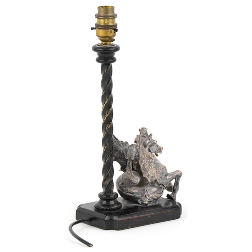 576 - A silver plated study of Pegasus mounted on an ebonised table lamp base, 26cm high.