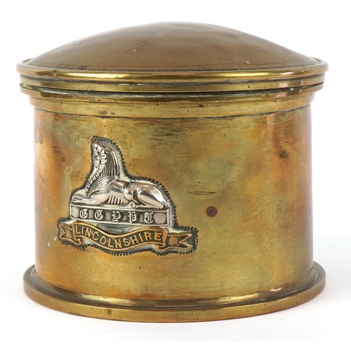 2807 - A British military World War I trench art tobacco box with hinged lid and Egypt Lincolnshire cap bad... 