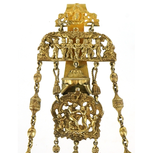 303 - Archibald Douglas, a Victorian silver gilt chatelaine pierced with Putti and scrolling foliage, Lond... 