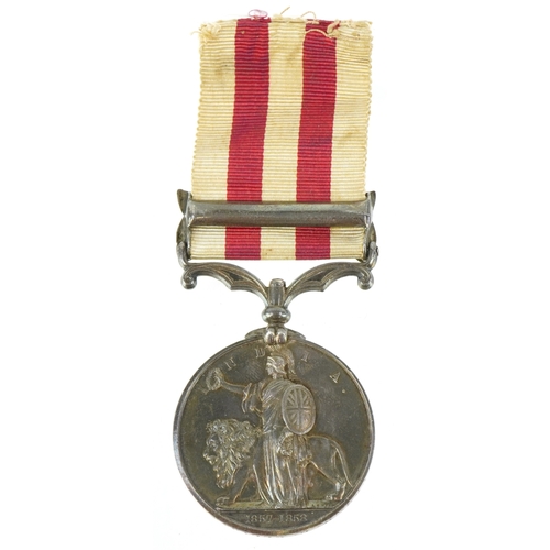 2638 - A Queen Victoria Indian Mutiny medal awarded to Assistant Surgeon W.C.Elliott 4th Madras Cavalry wit... 