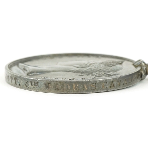 2638 - A Queen Victoria Indian Mutiny medal awarded to Assistant Surgeon W.C.Elliott 4th Madras Cavalry wit... 