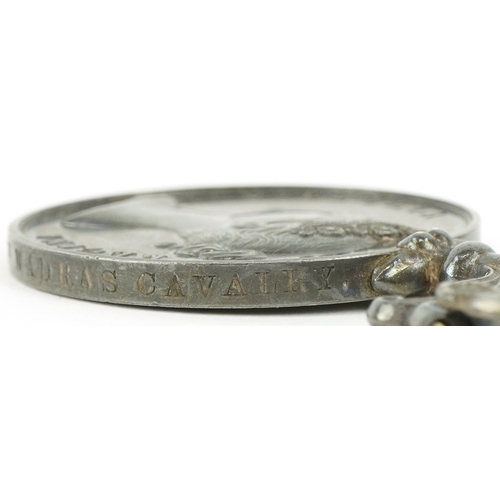 2638 - A Queen Victoria Indian Mutiny medal awarded to Assistant Surgeon W.C.Elliott 4th Madras Cavalry wit... 