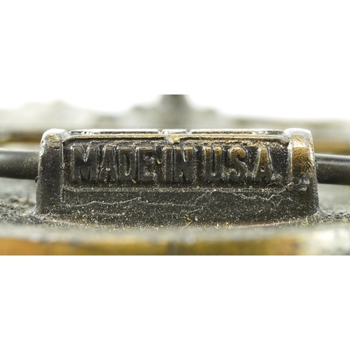 1845 - Two vintage American cast metal belt buckles including an enamelled rhinoceros example, the largest ... 