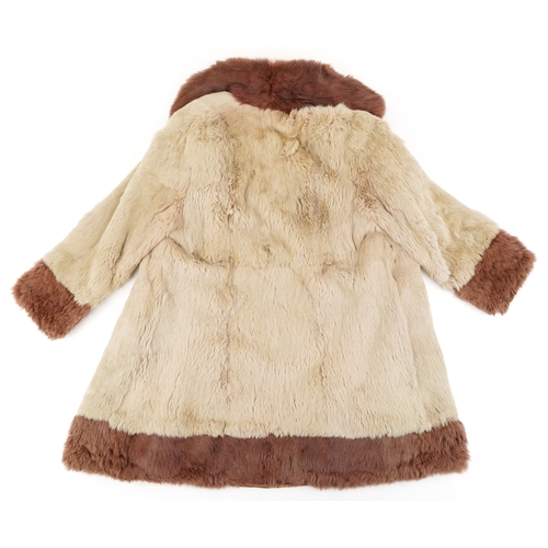 1029 - A vintage ladies Dysons fur coat, pit to pit 52cm and 85cm in length.