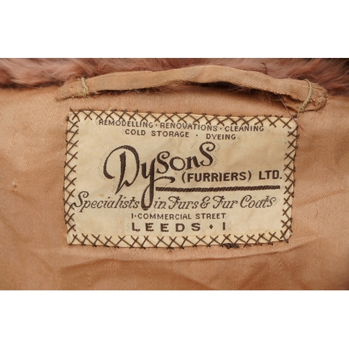 1029 - A vintage ladies Dysons fur coat, pit to pit 52cm and 85cm in length.