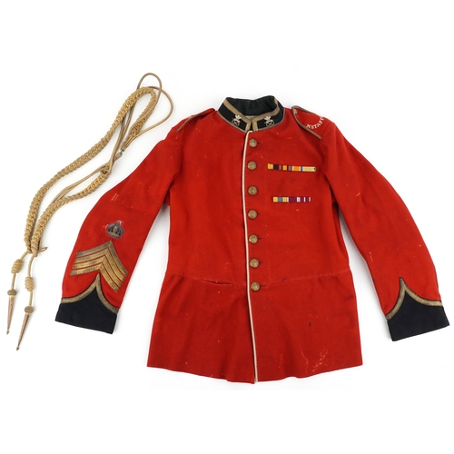 2765 - A British military North Staffordshire Regiment officer's dress tunic with N. Stafford epaulets.