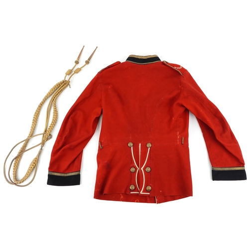 2765 - A British military North Staffordshire Regiment officer's dress tunic with N. Stafford epaulets.