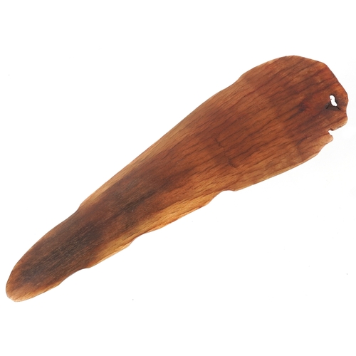 98 - A Chinese rhinoceros horn leaf shaped brush washer carved in relief to one side, pierced to the top ... 