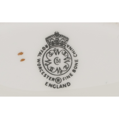 667 - A collection of Royal Worcester fine bone china cigarette holders, variously decorated, 7cm wide.