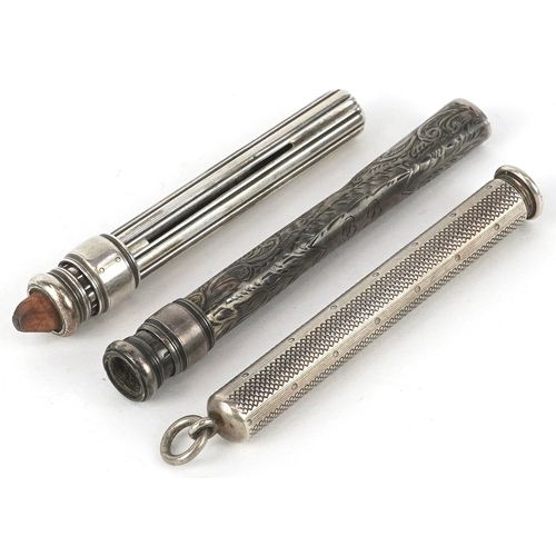 69 - Three silver propelling pencil cases, the largest 7.7cm in length, total 40.2g.