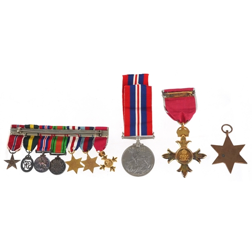 2692 - British military medals including an OBE with box, Territorial medal, dress medals and postage box a... 