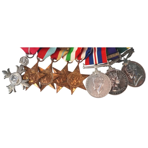 A British military World War II medal group awarded to MAJOR.J.A.EVANS.R.E.M.E including MBE, General Service medal with Near East bar, Territorial War medal and The Africa Star with 8th Army Bar.