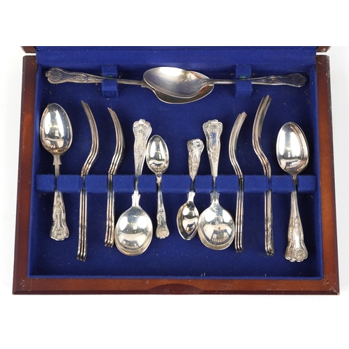 3753 - A six place setting of Sheffield silver plated cutlery housed in a mahogany canteen, 40cm wide.