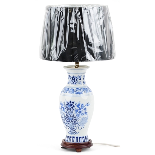 1818 - An as new Chinese blue and white porcelain table lamp with shade, 39cm high.