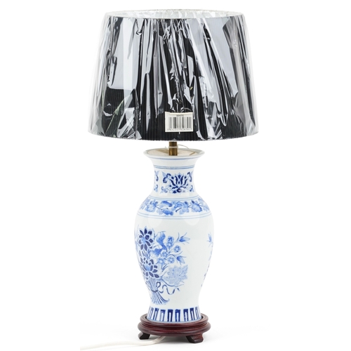 1818 - An as new Chinese blue and white porcelain table lamp with shade, 39cm high.