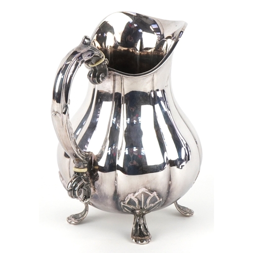 3562 - Carl M. Cohr of Fredericia, a Danish silver milk jug raised on four feet having naturalistic handle,... 