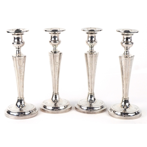 A set of four American sterling silver tapering candlesticks with engraved decoration, YC Co. maker's mark, 22cm high, total weight 1478.0g