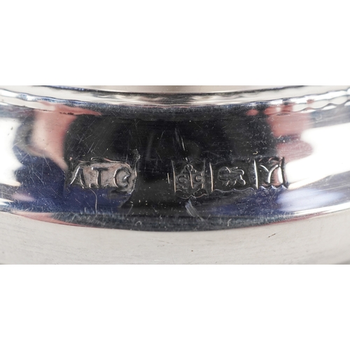 3677 - A T Cannon Ltd., a pair of Elizabeth II circular silver dwarf candlesticks, Birmingham 1973, 7cm hig... 