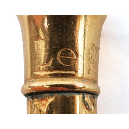 85 - Six gold plated and yellow metal propelling pencils, some with engine turned decoration including Cr... 