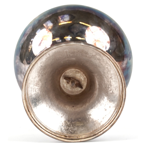 212 - An ecclesiastical silver plated chalice having enamelled panels with religious icons, 22cm high.