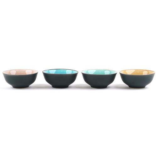 558 - A set of four Japanese crackle glazed rice bowls, 11cm in diameter.