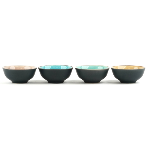 558 - A set of four Japanese crackle glazed rice bowls, 11cm in diameter.