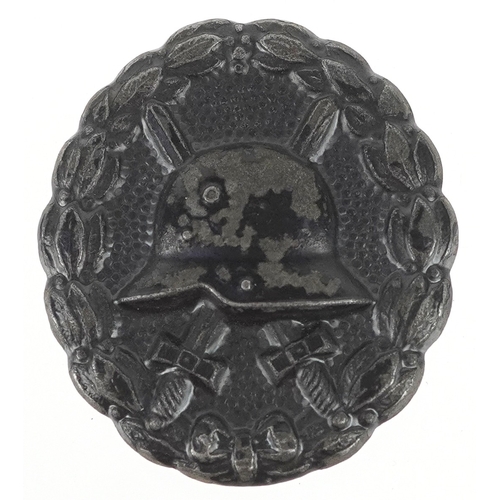 2733 - A German military interest Wound style badge.