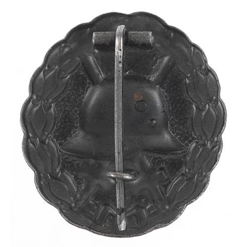 2733 - A German military interest Wound style badge.