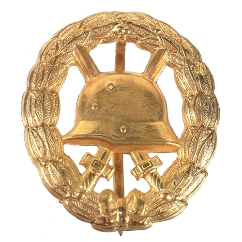 2732 - A German military interest Wound style badge.